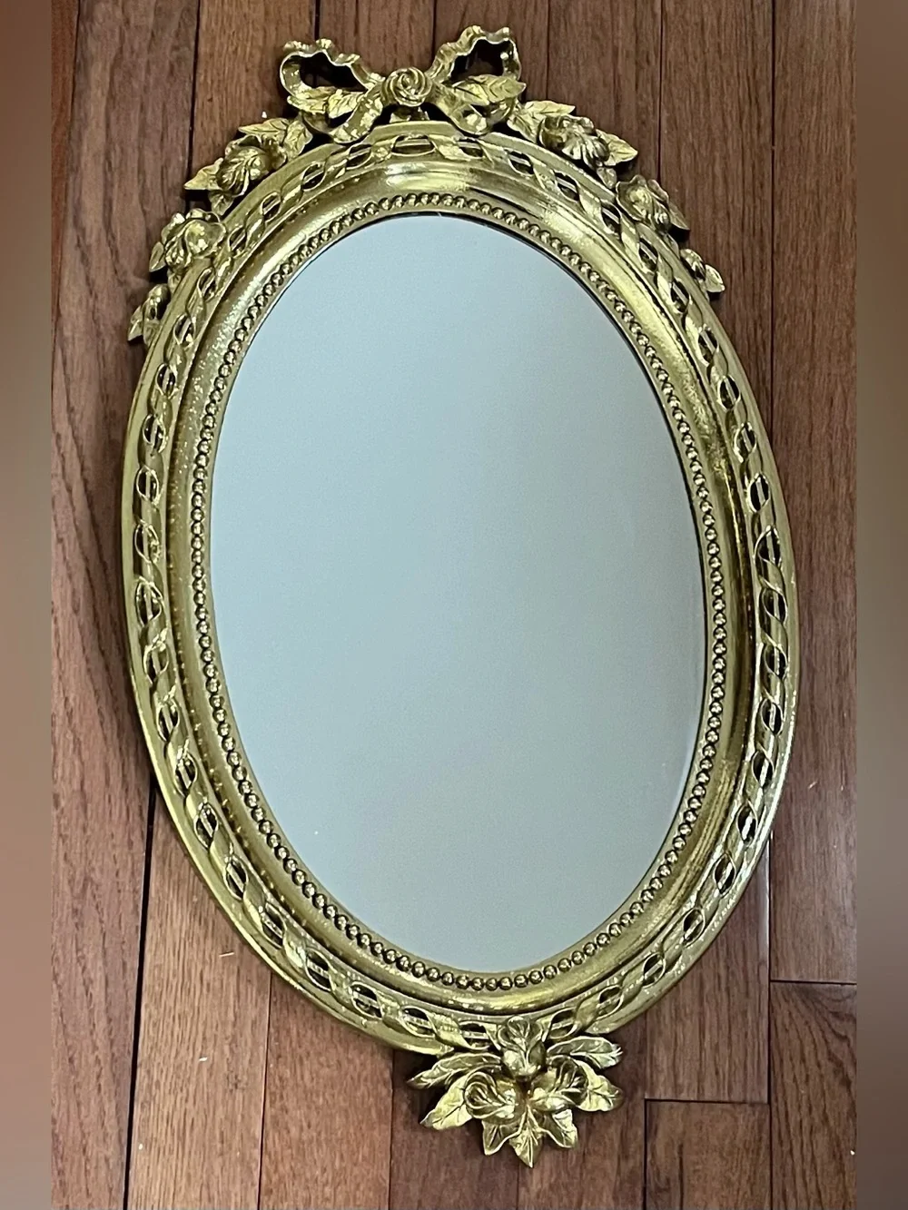 Home Interiors Gold Ornate Oval Wall Mirror with Floral Bow Accent